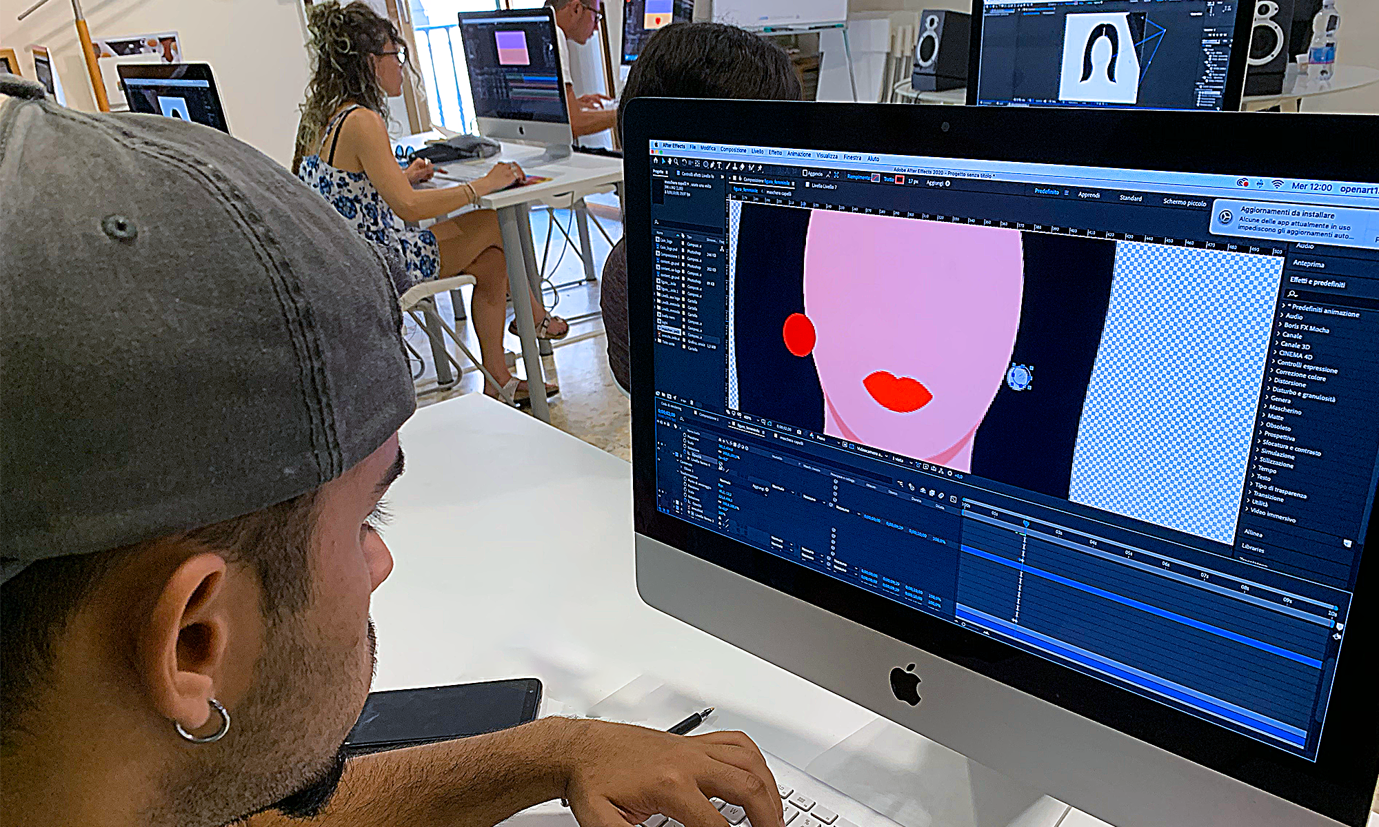 Lezione di grafica al computer nel corso professionalTop